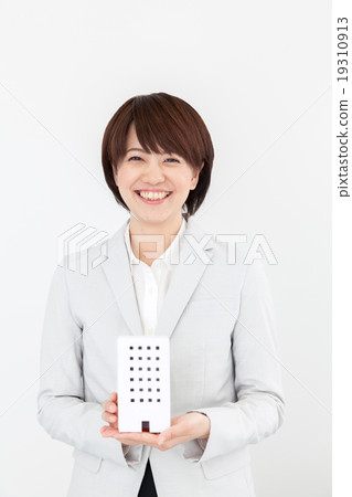 A woman with a business building A woman with a business building 19310913