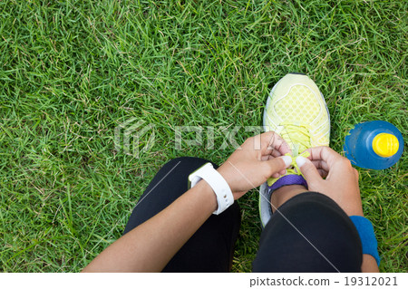 athletic woman tying laces ready to fitness sport 19312021
