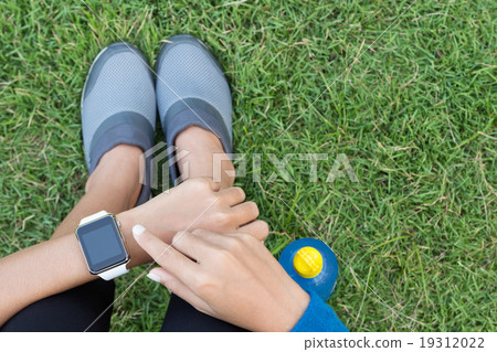 athletic woman using smartwatch on top view 19312022