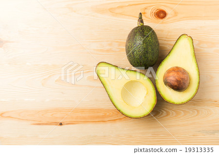 Sliced Avocado on wood Sliced Avocado on wood 19313335