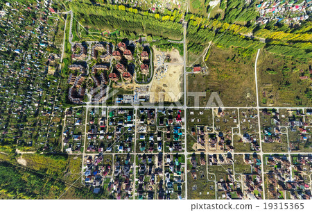 Aerial view of downtown. Crossroads, houses, buildings and parks. 19315365