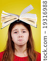 Sad Portrait of a cute little schoolgirl 19316988