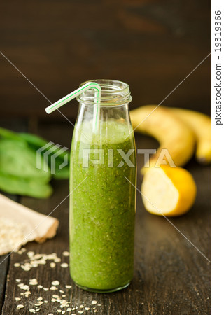 fresh detox green smoothie with spinach 19319366
