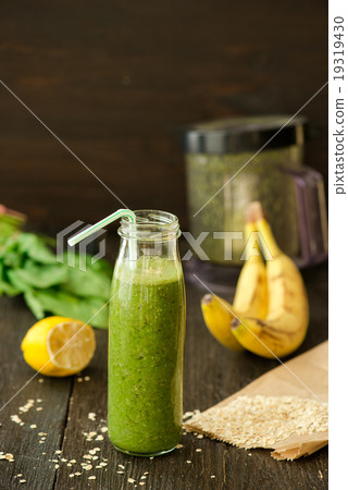 fresh detox green smoothie with spinach 19319430
