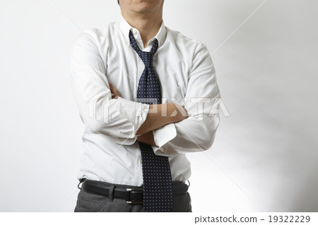 A tired businessman A tired businessman 19322229