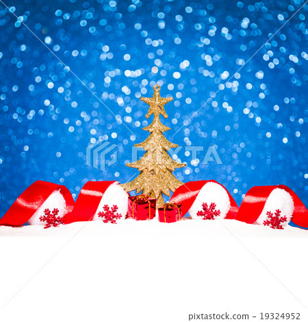 Golden Christmas tree on glitter blue background Golden Christmas tree on glitter blue background 19324952