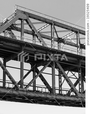 Steel truss bridge construction closeup fragment Steel truss bridge construction closeup fragment 19325409
