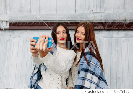 Two girls make selfie Two girls make selfie 19325492