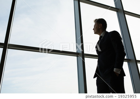 Man at the window 19325955