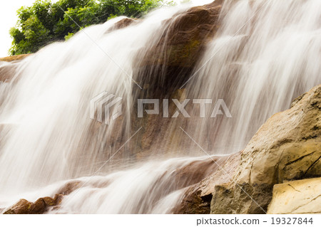 beautiful waterfall on the rocks beautiful waterfall on the rocks 19327844