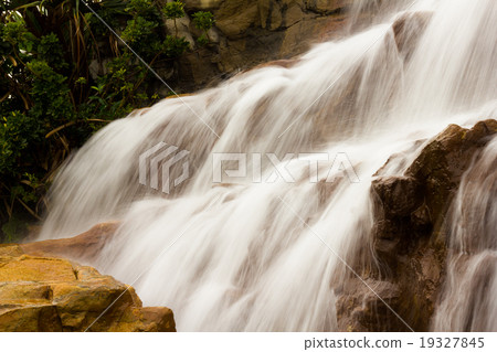 beautiful waterfall on the rocks beautiful waterfall on the rocks 19327845
