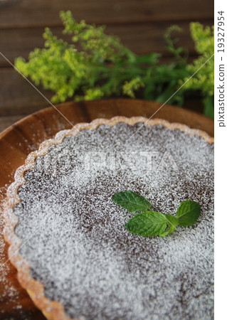 Homemade chocolate tart with moist ganache Homemade chocolate tart with moist ganache 19327954