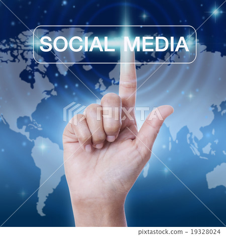 hand pressing social media word button.  19328024