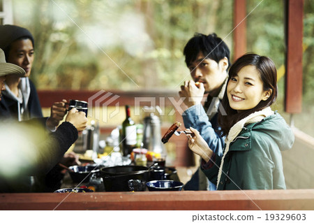 A couple to have a meal with a friend 19329603