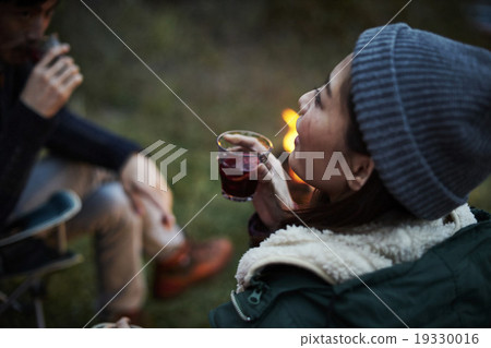 A woman drinking wine A woman drinking wine 19330016