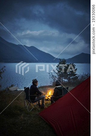 A couple serving as a bonfire 19330066