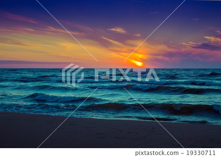 Beautiful pink sunset over sea 19330711