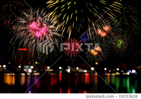 Fireworks celebration and the city night light. Fireworks celebration and the city night light. 19333626