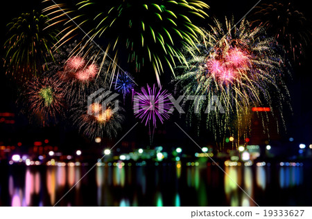 Fireworks celebration and the city night light. Fireworks celebration and the city night light. 19333627