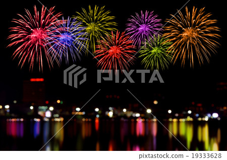 Fireworks celebration and the city night light. Fireworks celebration and the city night light. 19333628