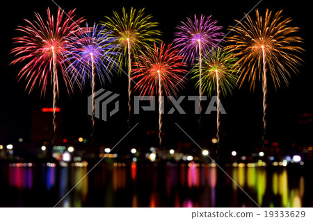 Fireworks celebration and the city night light. Fireworks celebration and the city night light. 19333629