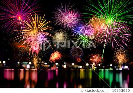 Fireworks celebration and the city night light. 19333630