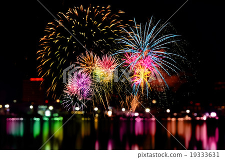Fireworks celebration and the city night light. 19333631