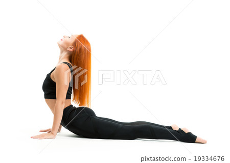 Sporty young woman doing yoga asana Sporty young woman doing yoga asana 19334676