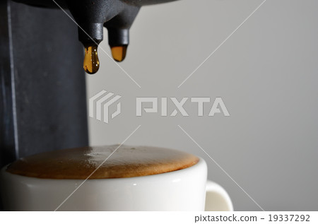 drops of espresso and coffee machine drops of espresso and coffee machine 19337292