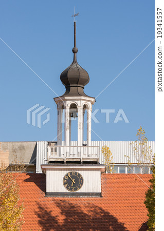 Bell tower with a clock on the building of church Bell tower with a clock on the building of church 19341557