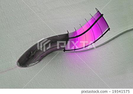 violet lamp on the wall, energy details. 19341575
