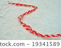 red stripped pvc cord on the snow. 19341589