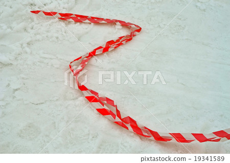 red stripped pvc cord on the snow. 19341589