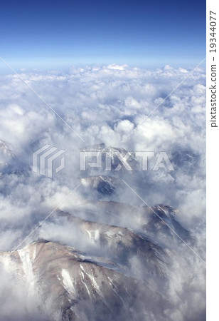 Chile of South America, Andean summit showing face in the clouds of the sea of clouds 19344077
