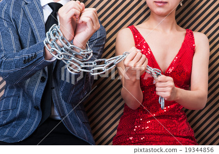 woman in chains Stock Photo