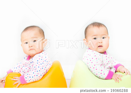 Cute twin baby 19360288