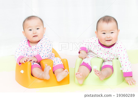 Cute twin baby 19360289
