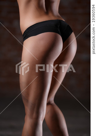 Beautiful athletic buttocks close-up Beautiful athletic buttocks close-up 19360594