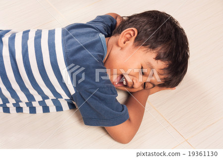 little boy laughing on the floor little boy laughing on the floor 19361130