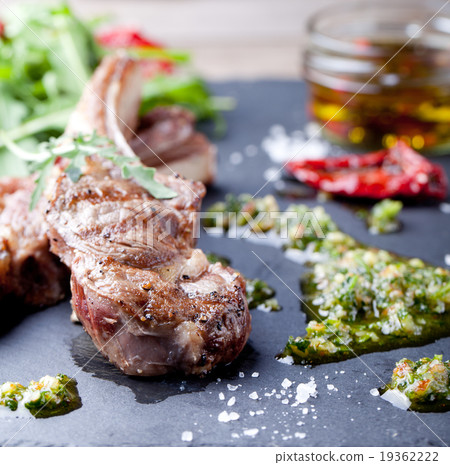 Grilled meat, mutton, lamb rack with fresh salad. 19362222