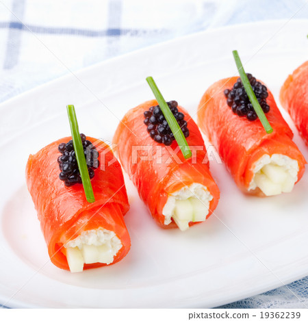 Smoked salmon rolls cream cheese, black caviar 19362239