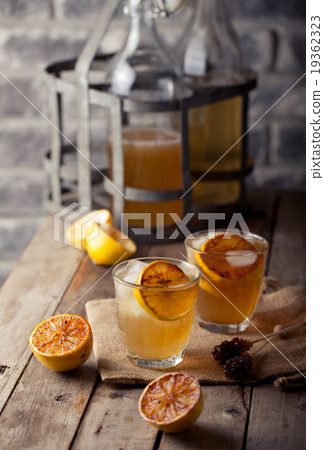 Lemonade in glasses and bottles Cider 19362323