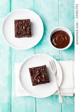Chocolate brownie, cake, white plate Chocolate brownie, cake, white plate 19362701
