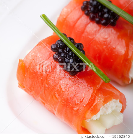Smoked salmon rolls cream cheese, black caviar 19362840
