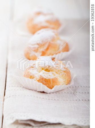Profiteroles, choux with a custard cream. Dessert 19362858