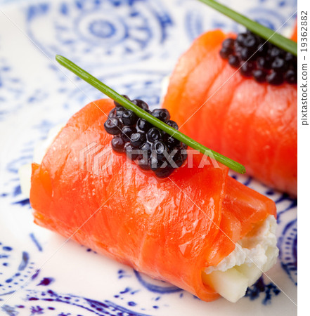 Smoked salmon rolls cream cheese, black caviar Smoked salmon rolls cream cheese, black caviar 19362882