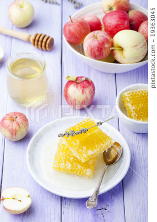 Honey, honeycombs and fresh apples 19363045