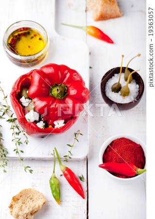 Baked stuffed bell peppers filled with cheese 19363057