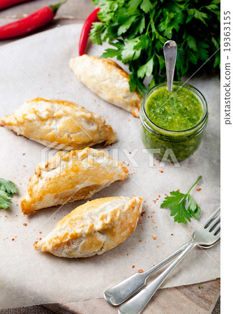 Empanadas with meat and green chili sauce 19363155
