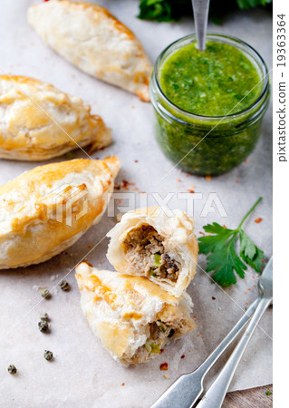 Empanadas with meat and green chili sauce Empanadas with meat and green chili sauce 19363364